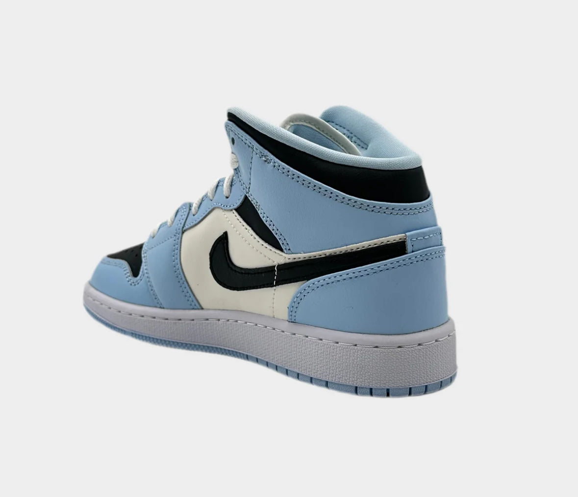 Jordan 1 mid ice blu