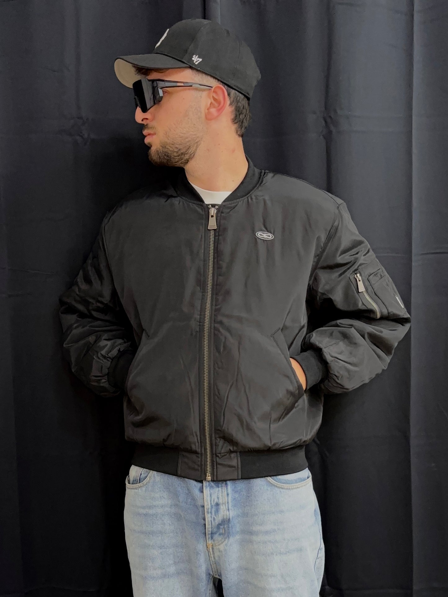 Bomber jacket logo atom